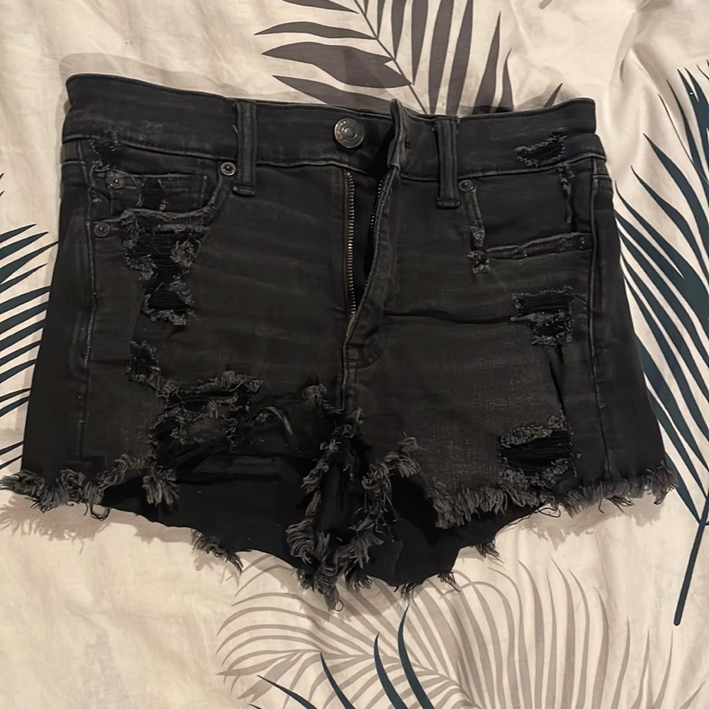 Distressed black short shorts